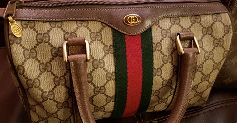 how to know if a gucci purse is rea